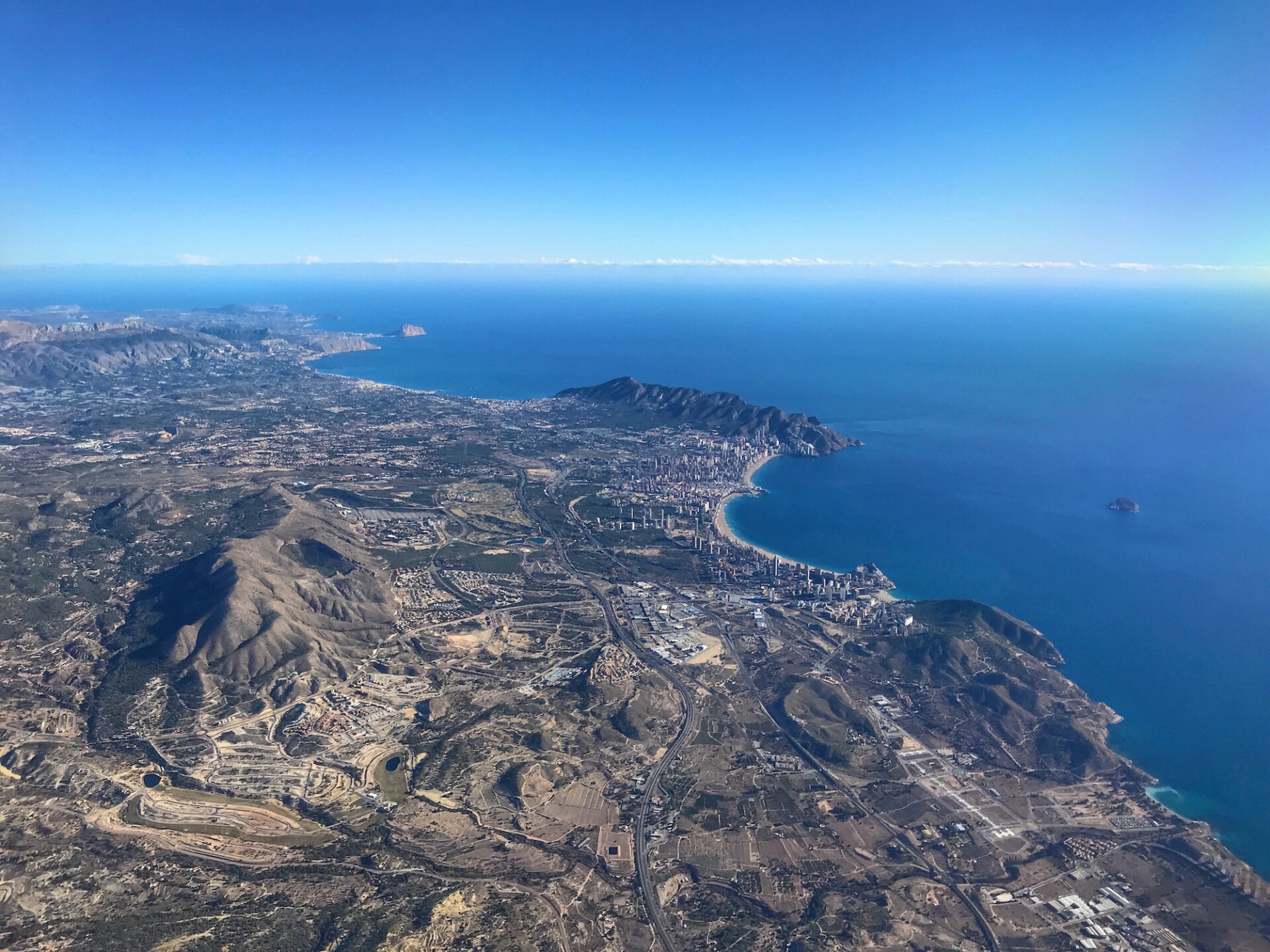 Aerial view from aeroplane Mediterranean coastline including Benidorm, Alicante Province, Spain