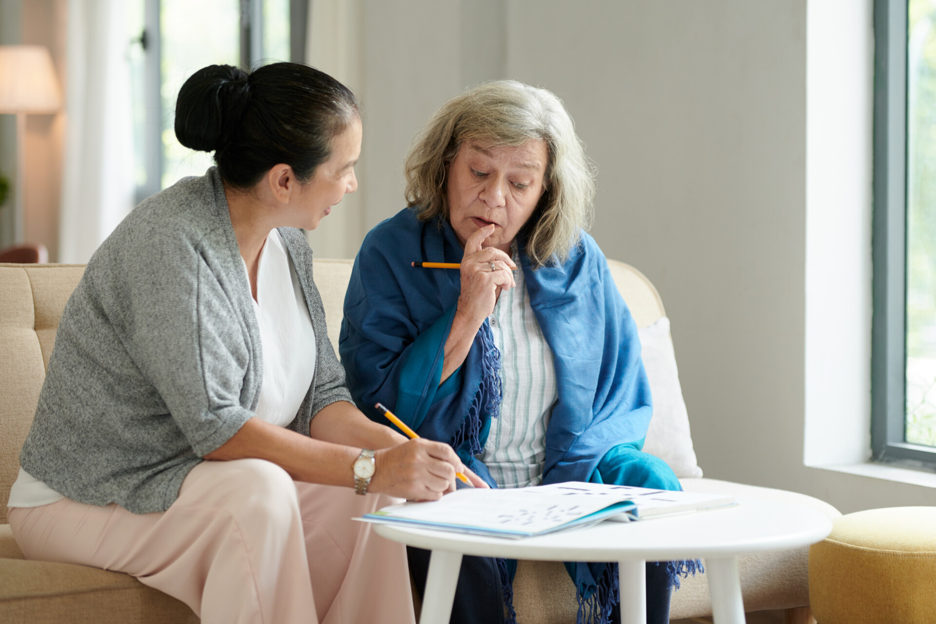 Nursing Home Patients Solving Crossword