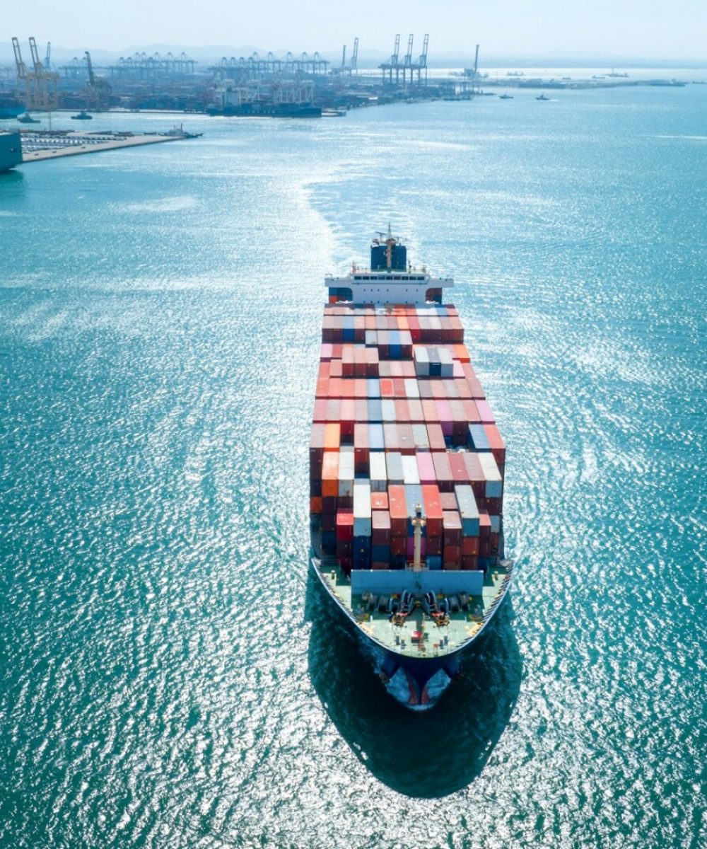 front view Cargo Container ship in the ocean ship carrying container and running